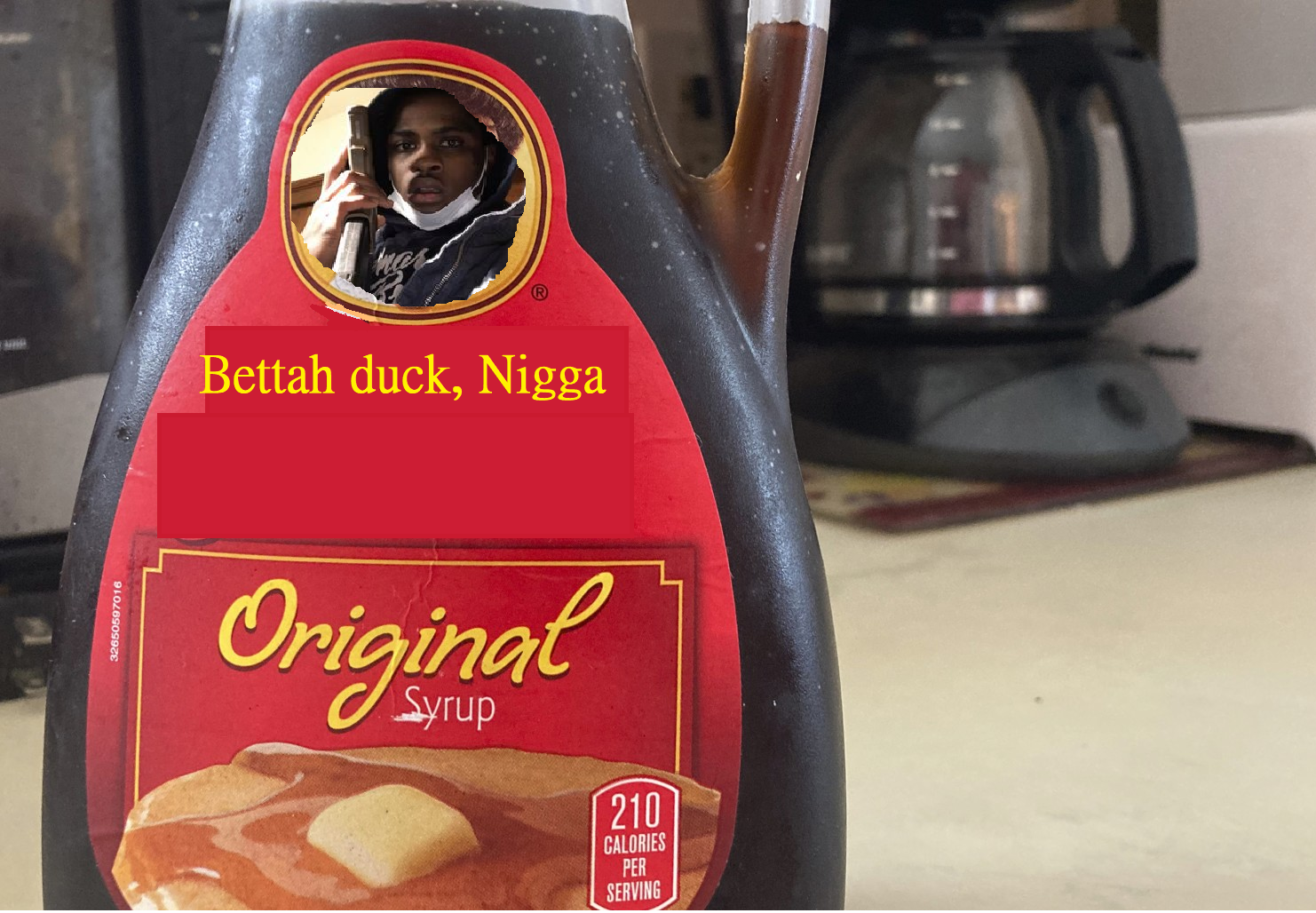 A badly photoshopped pancake syrup logo with an african american with a gun with the label "bettah duck, nigga" A badly photoshopped pancake syrup logo with an african american with a gun with the label "bettah duck, nigga"