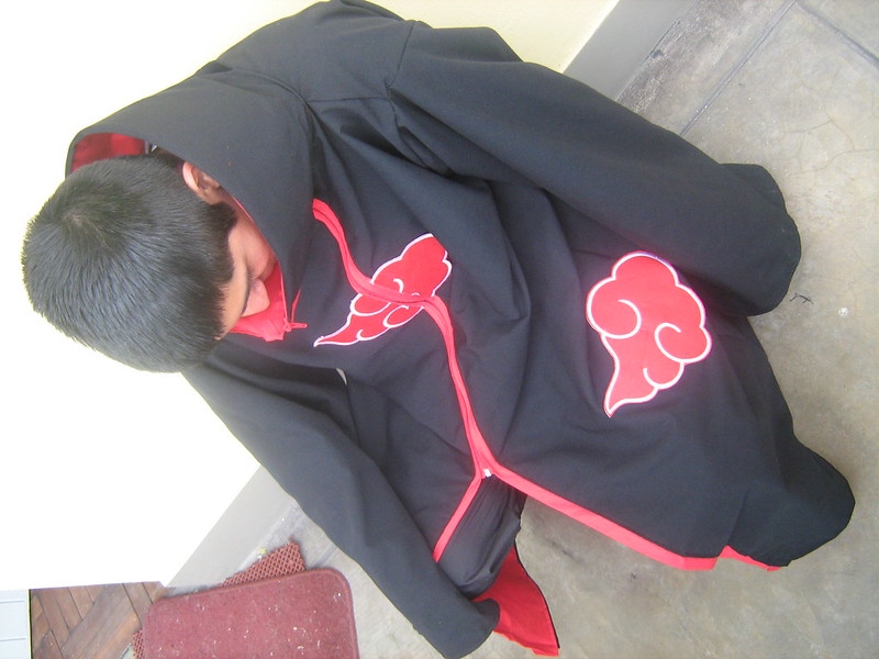 Someone wearing a Naruto akatsuki robe